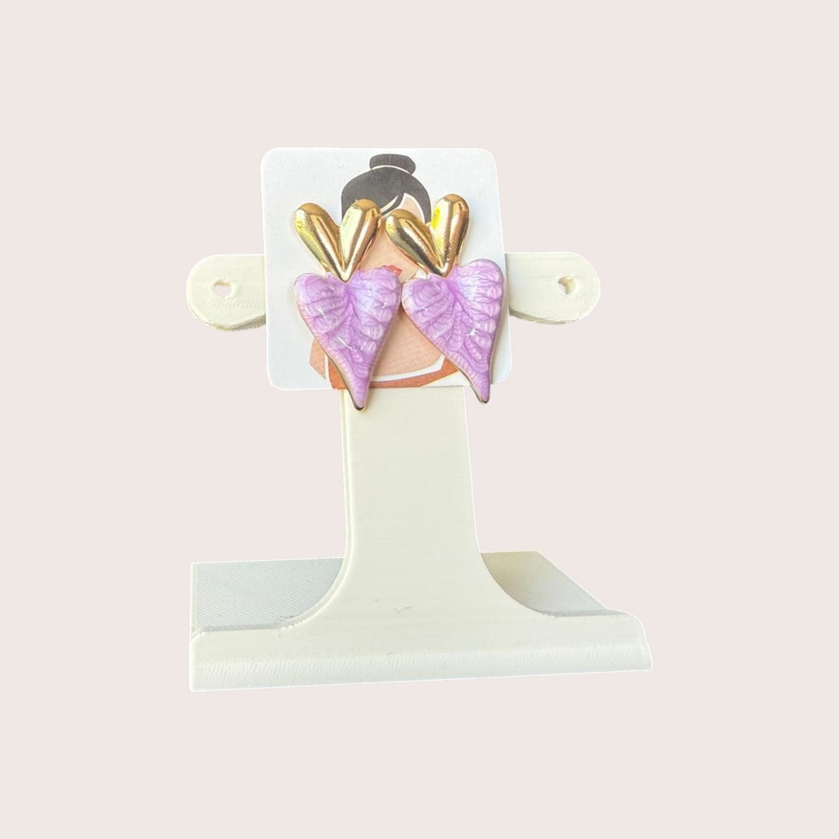Nitelief Amour Rose dangling heart earrings featuring gold tops and textured light pink heart-shaped drops.