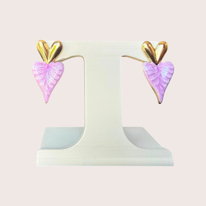 Nitelief Amour Rose dangling heart earrings featuring gold tops and textured light pink heart-shaped drops.