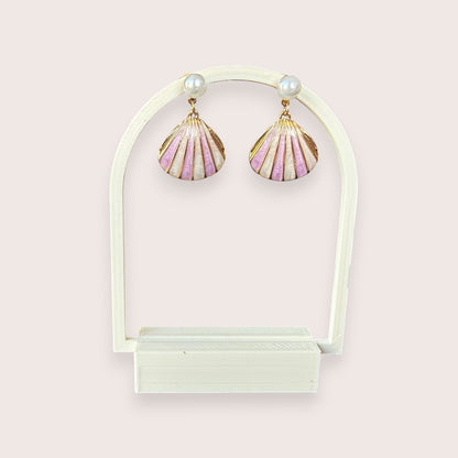 Nitelief Luna Pearl earrings featuring gold-tone stainless steel, dusty pink shell details, and small white pearls.